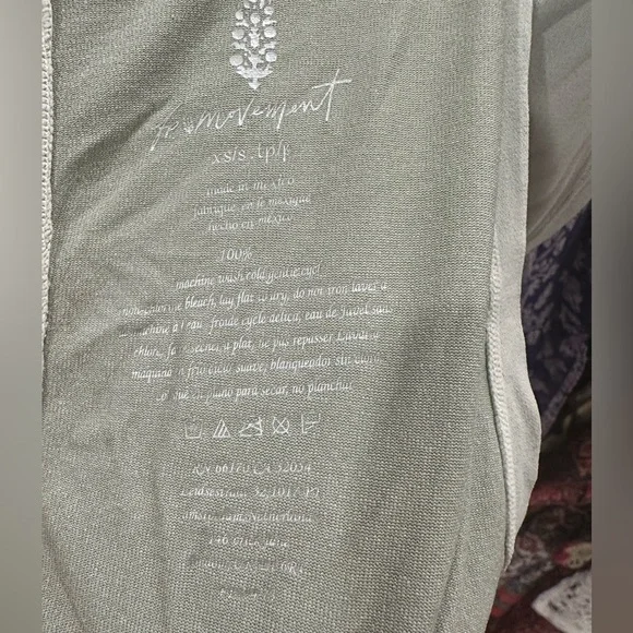 FREE PEOPLE MOVEMENT CUTOUT TANK TOP IN LIGHT GREEN - Picture 4 of 6